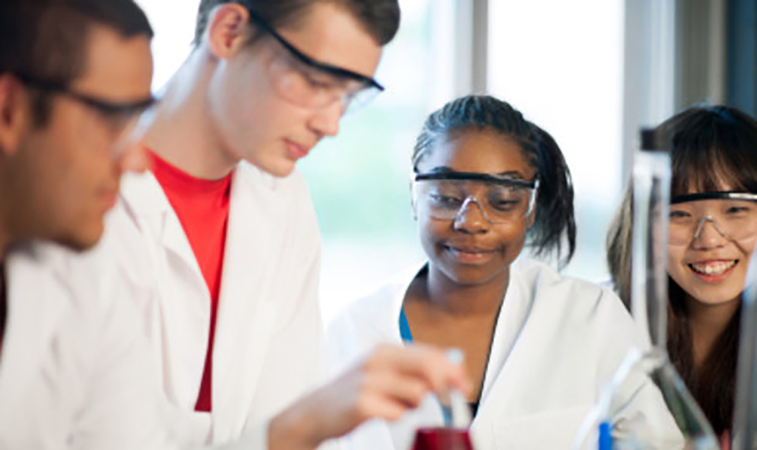 Photo of students working in a lab